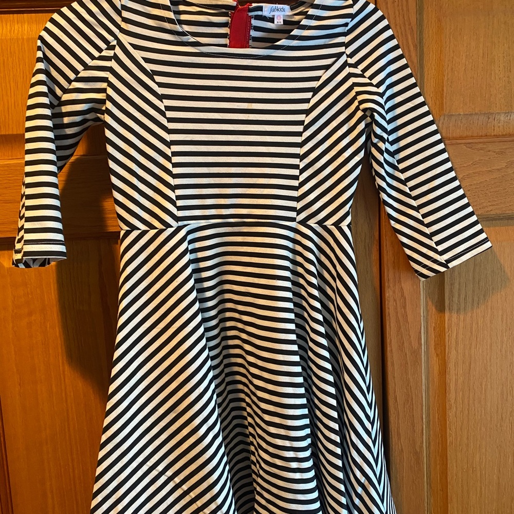 Black and white strip dress with red zipper down back